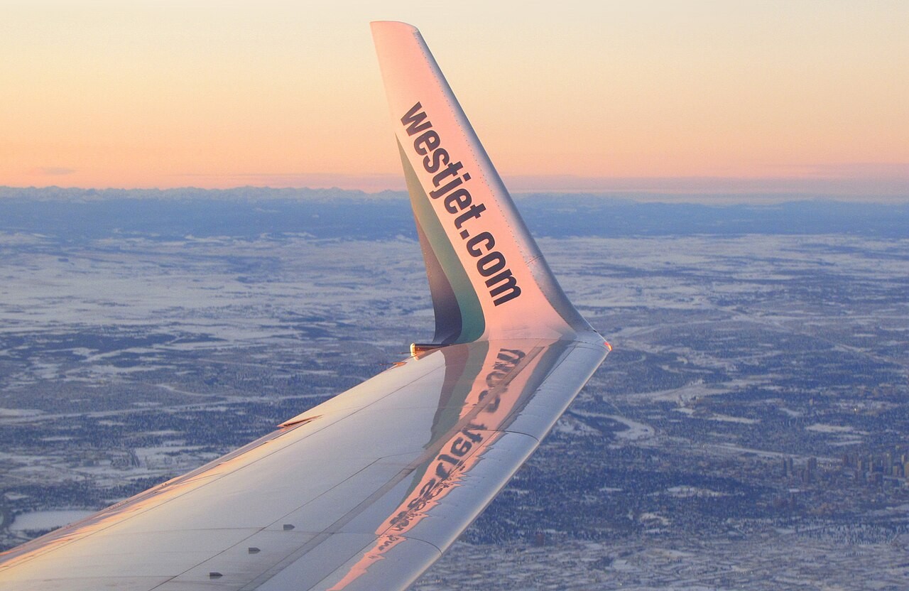 A WestJet aircraft wing in a file photograph. Airline context; not a flight operated under the new agreement.