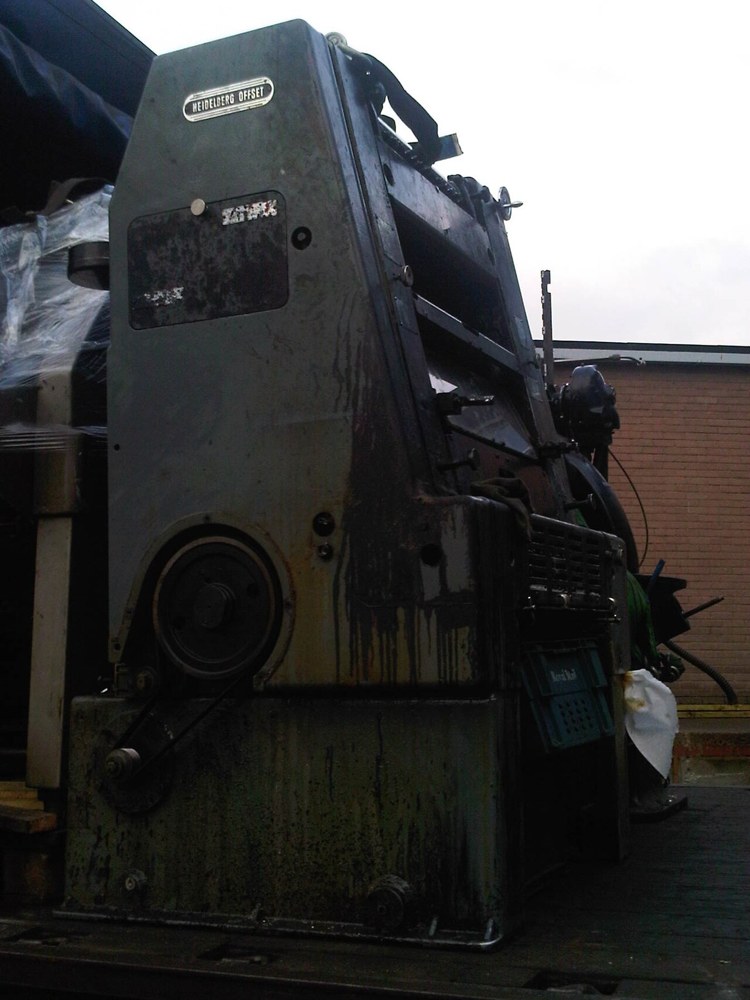 A Heidelberg offset printing machine loaded onto a truck. File illustration of printing equipment, not University Press machinery or premises.