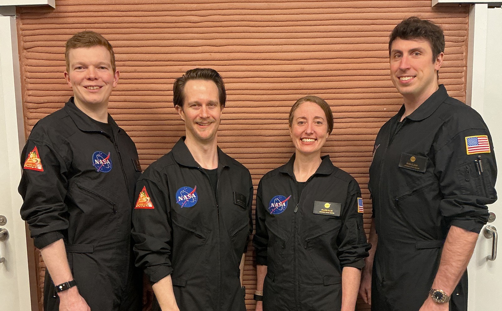 The four CHAPEA Mission 2 crew members inside their habitat at NASA Johnson Space Center. This is an Earth-based simulation, not Mars.