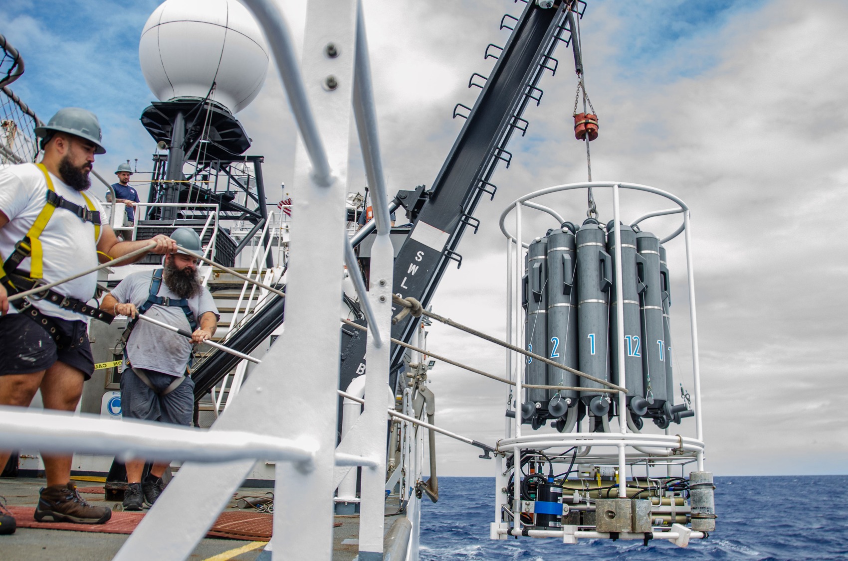 A CTD rosette being deployed during NOAA's 2022 Caribbean Mapping expedition. NOAA Ocean Exploration. Historical water-sampling photograph; not the portal launch.