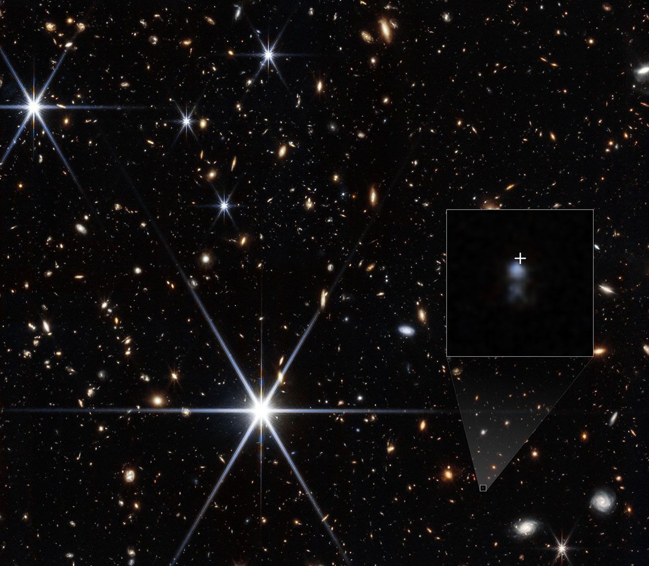 Webb infrared image of the galaxy field containing FRB 20240304B's host. The inset and cross mark the location; this is not a photograph of the radio flash itself.