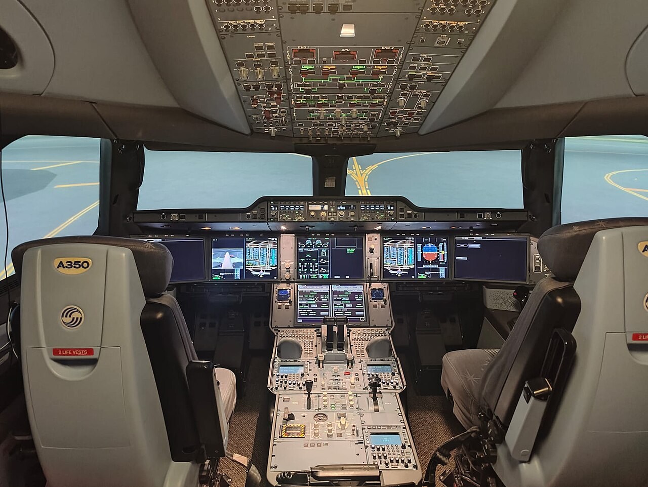 An A350 flight-simulator cockpit. Context image of simulation technology; it does not show Genie 4 or a system powered by it.