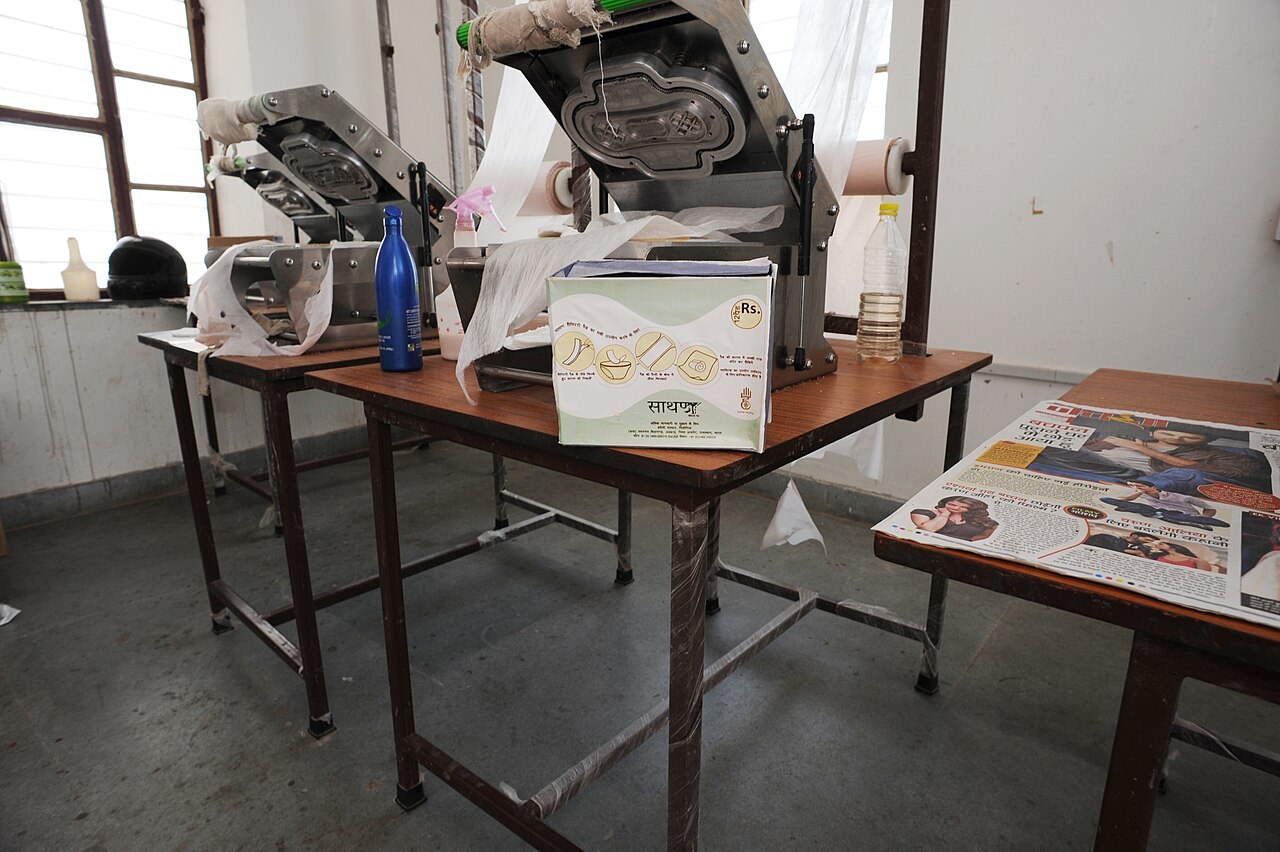 Sanitary towel manufacturing equipment in a file photograph. The image illustrates supplies and does not show Nigeria's distribution launch.